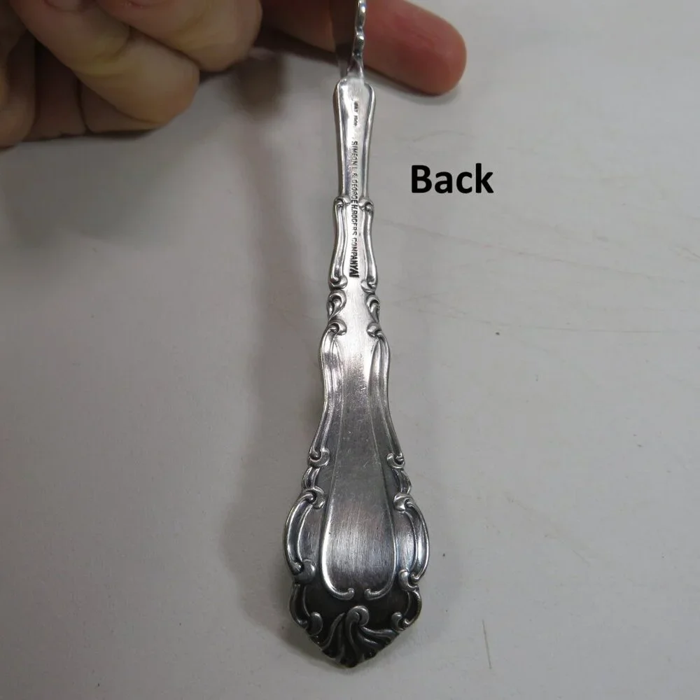 Webster Twisted Handle Butter Knife silver plated  S.L. & G.H. Rogers Company A1